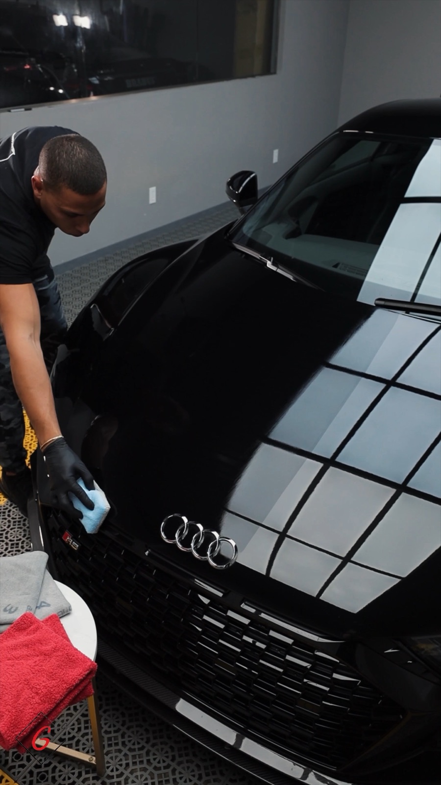 Black Audi R8 receiving a ceramic coating in the Irvine studio