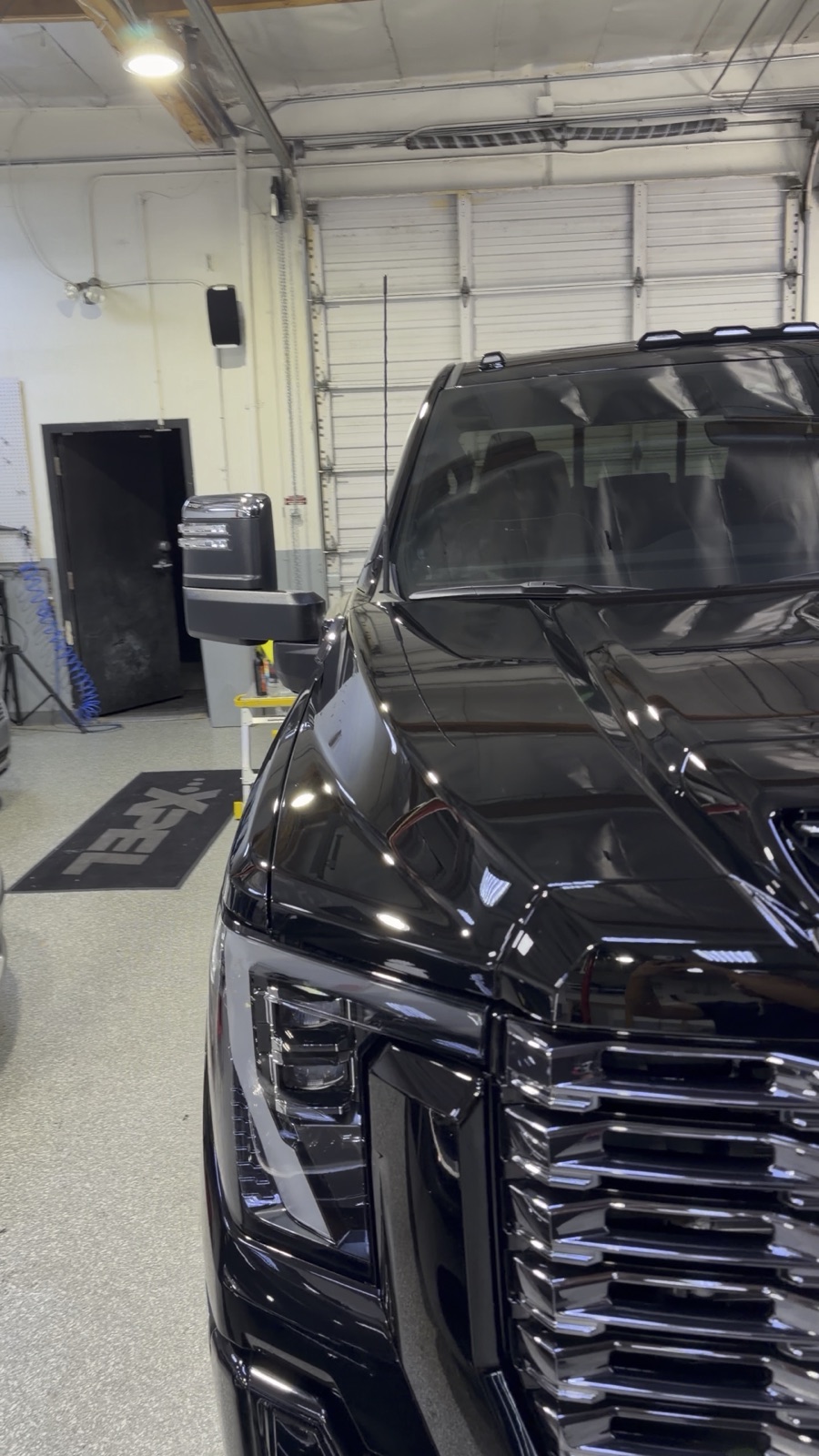 Black GMC Denali after ceramic coating, high-gloss finish
