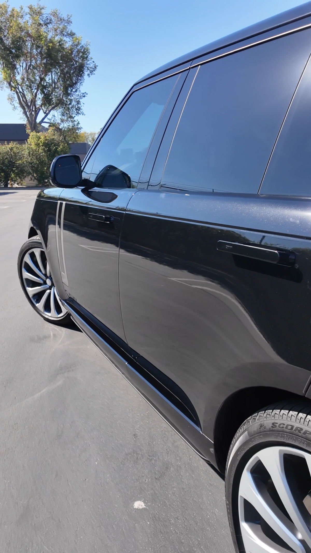 Black Range Rover with full-body gloss paint protection film, side profile, by G Wraps OC, Irvine