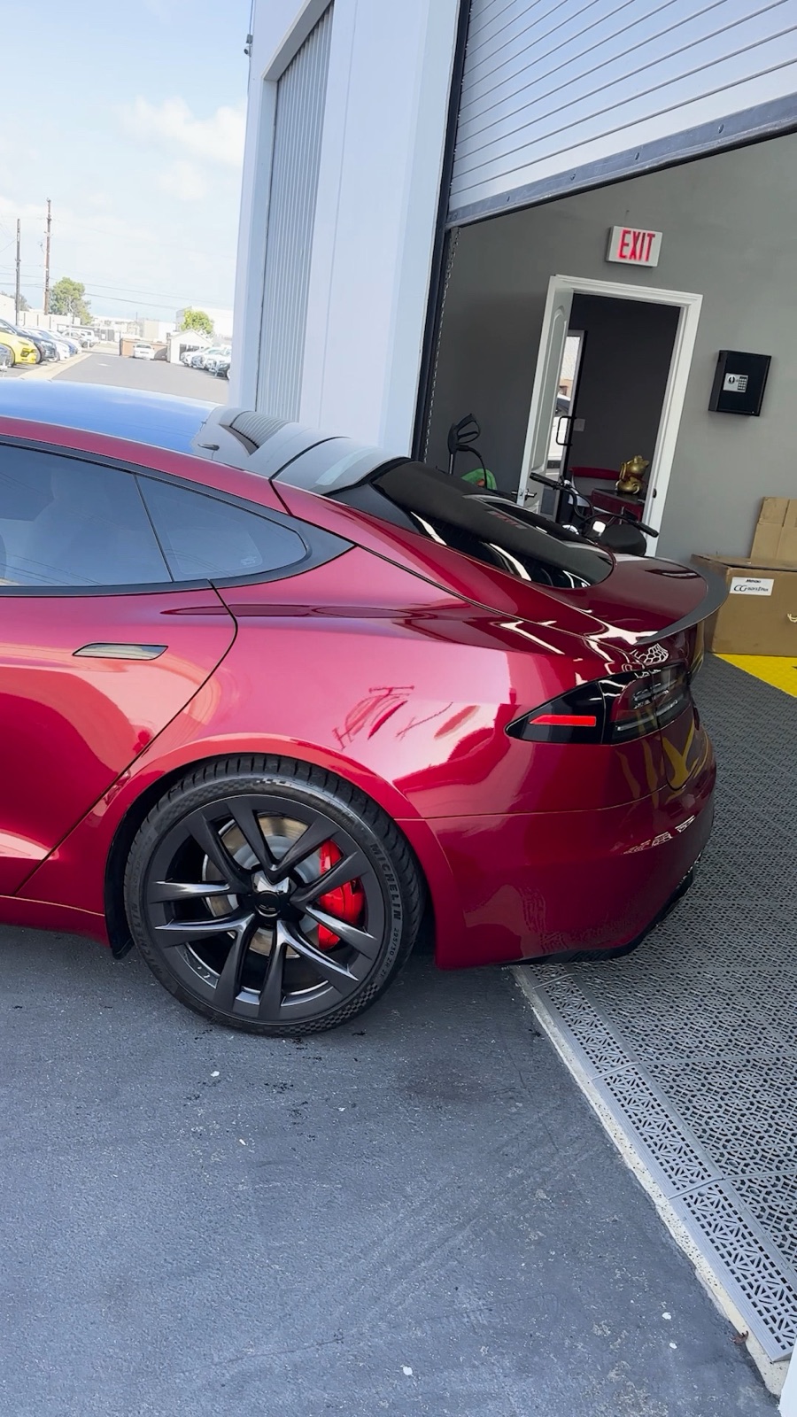 Deep-red Tesla Model S Plaid after ceramic coating